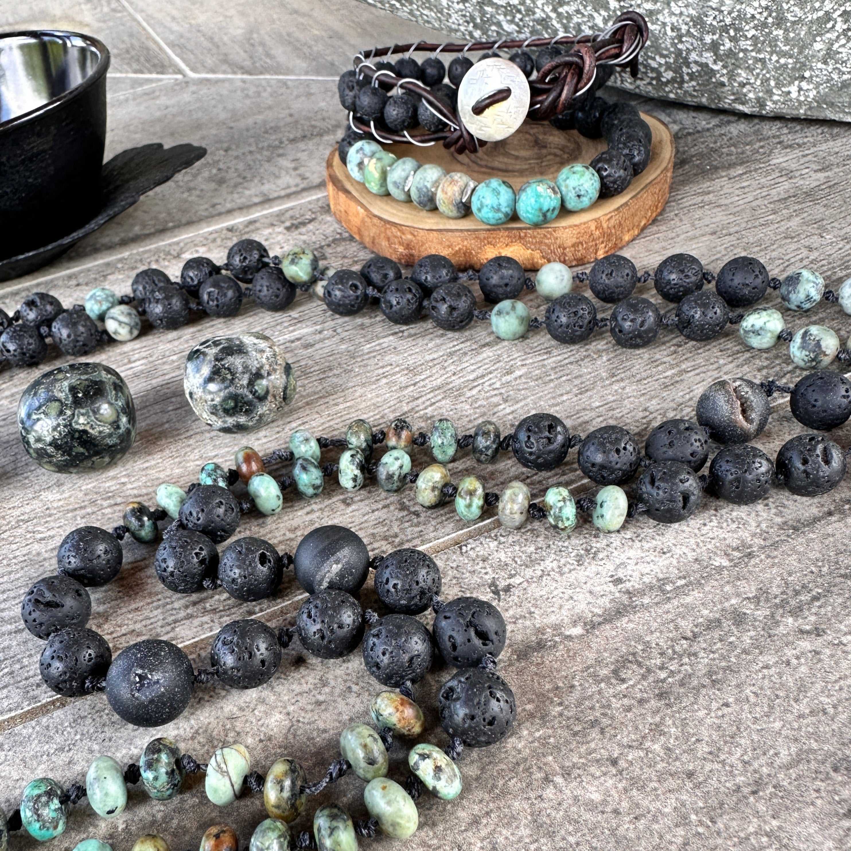 Handcrafted mala and bracelets with vibrant transformation-inspired beads