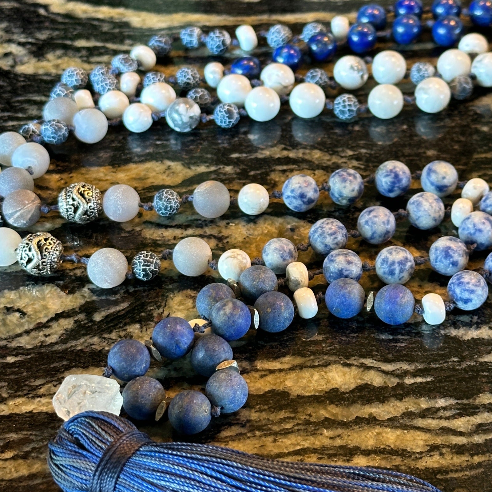 Handcrafted mala and bracelet with vibrant celestial-inspired beads