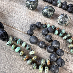 Handcrafted mala with vibrant transformation-inspired beads