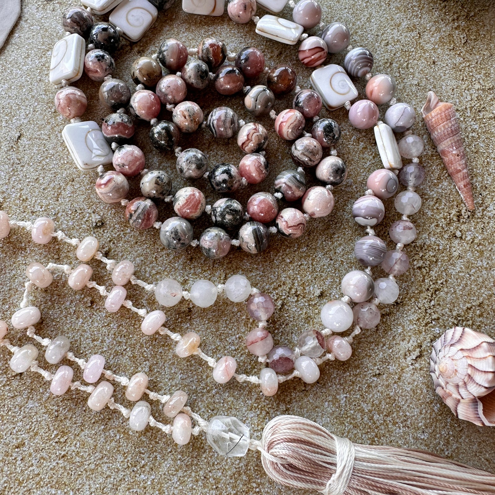 Handcrafted mala with vibrant seashell-inspired beads